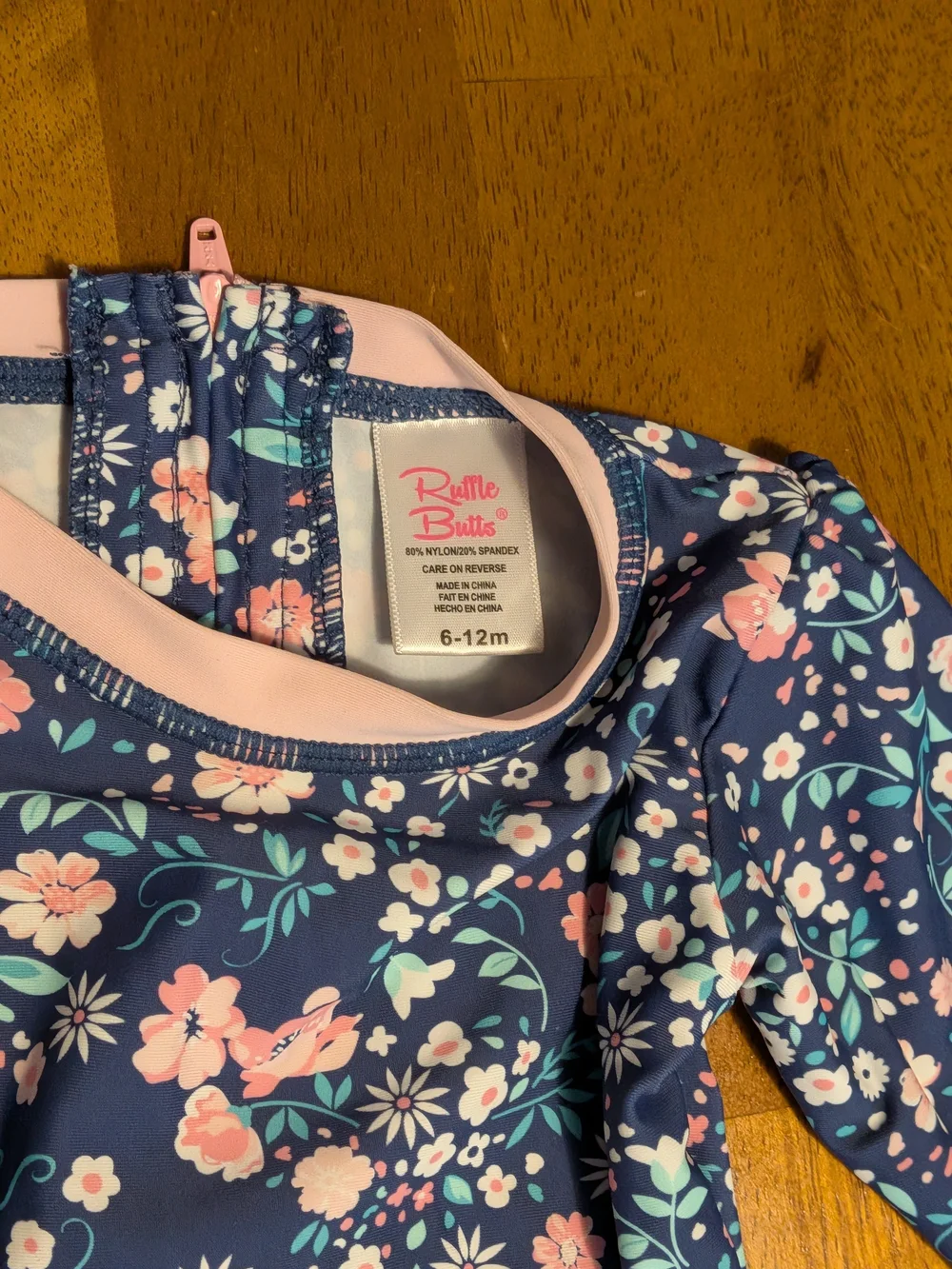 Ruffle Butts Navy Floral Long-Sleeve Swim Suit with Pink Trim